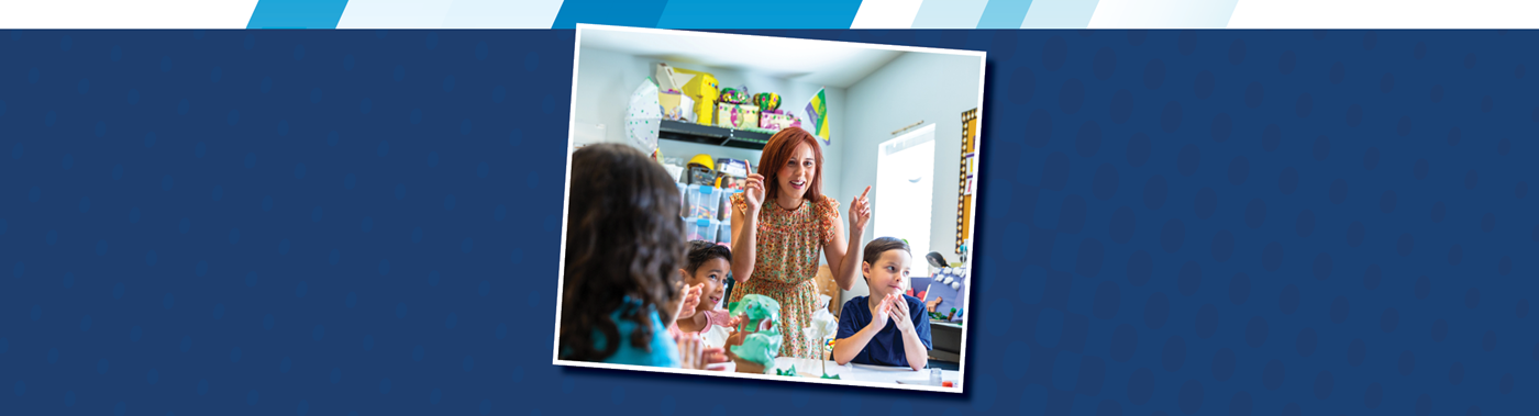 Teacher doing an activity with a group of students at a table