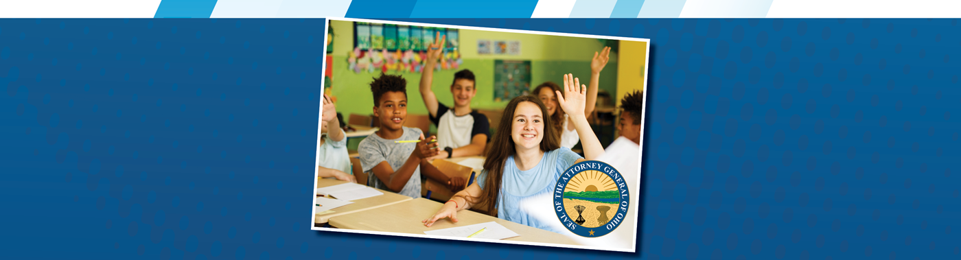 a classroom of middle school students with some raising their hands