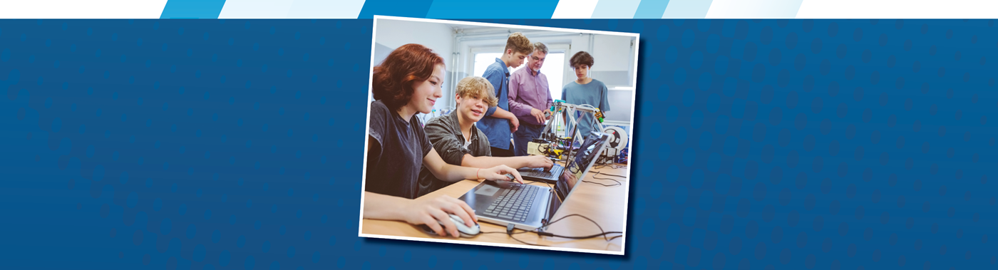 highschool students using a laptop and working on robotics