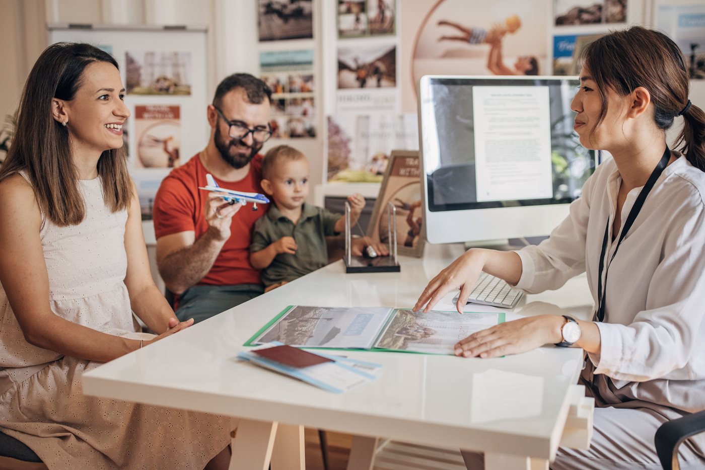 Couple with baby son talking to a woman