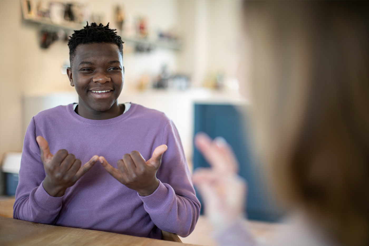 youth using sign language in school
